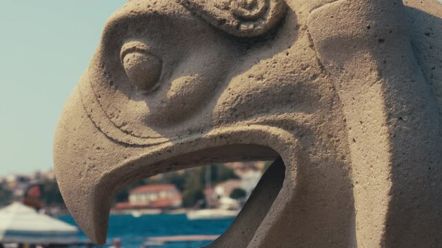 The Dock Behind the Bird Statue