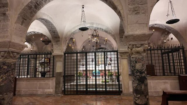 Romanesque crypt in the Basilica of St. Nicholas with the tomb and relics of St. Nicholas, Bari, Puglia.