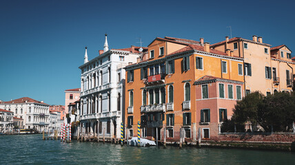 Beautiful Venetian architecture along the canal in sunny Venice, Italy