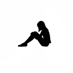 Silhouette of girl sitting with knees to chest in sadness on white background