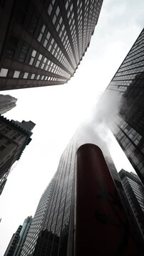 skyscrapers in New York smoke coming out of the sewers 