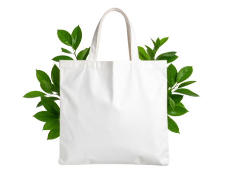 White reusable tote bag with handles, featuring green leaves peeking from behind, symbolizing eco-friendly and sustainable living.