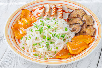 Rice Noodles with Shiitake, Grilled Peppers, Chicken, Sriracha, and Green Onion
