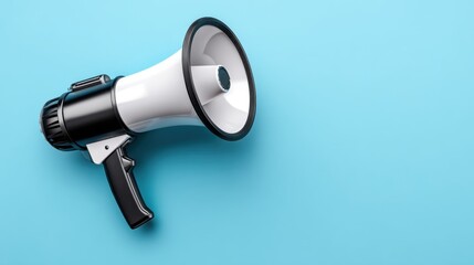 Bold Marketing Announcement Concept with Megaphone on Pastel Blue Background with Copy Space on Left Side