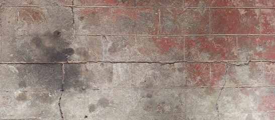 Distressed Brick Wall with Faded Red Paint Texture