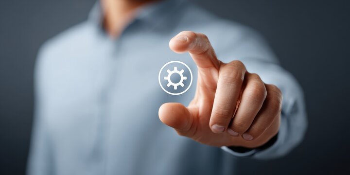 Innovating System Control - Hand Pushing Floating Settings Icon for Business Customization with Copy Space