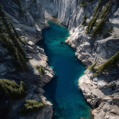 Obraz premium Aerial view of blue lake in rocky canyon