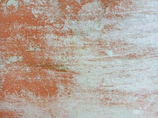 Vibrant Orange Wall with Peeling Aqua Paint Texture