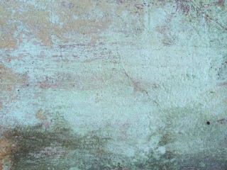 Weathered Concrete Wall with Green and Brown Patina