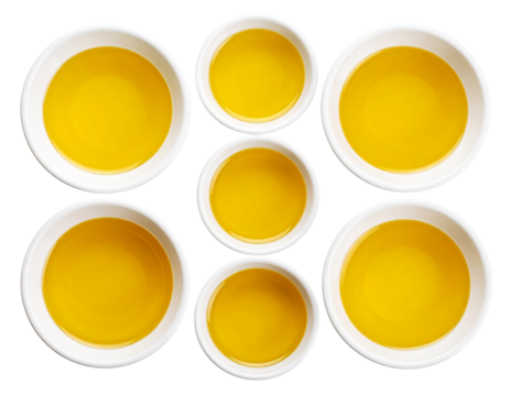Top View of Golden Cooking Oils in White Ceramic Bowls, Isolated on Transparent Background PNG