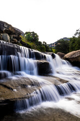 Obraz premium The Cascades waterfall in the Mahai River in the Drakensberg mountains, South Africa, photographed with log exposure.