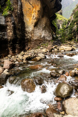 The Tugela River flowing through its narrow, boulder strewn gorge in the Drakensberg mountains in South Africa.