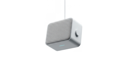 A modern, minimalist, white speaker suspended from a thin wire.