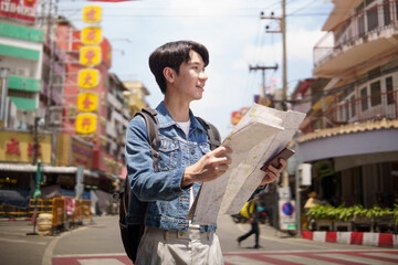 Young man tourist discovering new destinations during cultural journey.