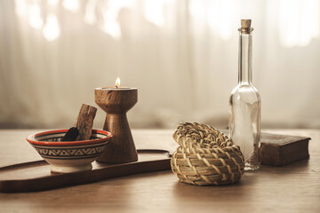 Burning Palo Santo and Candle on Wooden Tray for Relaxation and Meditation