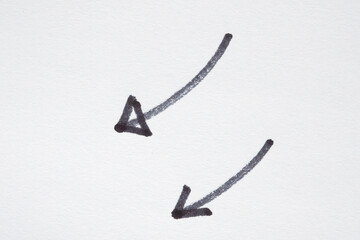 hand drawn arrow with black marker on white background