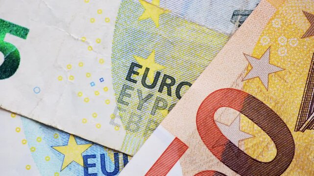 Macro close up of details of various European Union Euro bank notes.