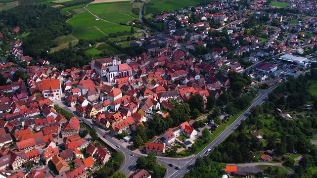 A panorama Aerial view around the old town of the city Dettelbach on an early summer day in Germany.	