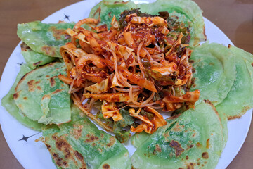 mandu twigim Fried Dumplings with Vegetables in Spicy Sauce