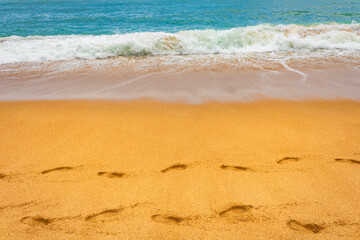 Unawatuna beach, footprints in the sand, close up, Sri Lanka