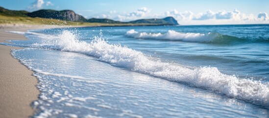Sunny beach waves crashing on sand