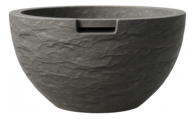 Rainwater catch basin with a decorative stone finish for a villa garden, blending seamlessly with natural surroundings.