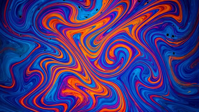  Abstract swirl of vivid orange and blue liquid with black dots forming psychedelic vortex. Animated image. Concept of hypnotic color flow, energetic visual art, and fluid chaos