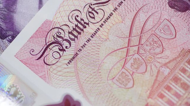 Macro close up of Pound Sterling bank notes.