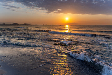 Fototapeta premium Tranquil sunrise meditation on a serene beach