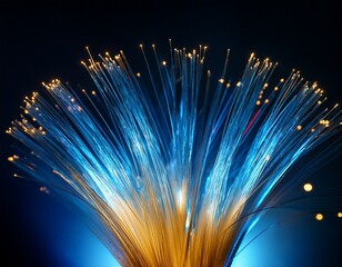 bright blue and gold abstract fibers glowing against a dark background at night
