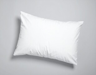 Obraz premium White Pillow on Gray Background