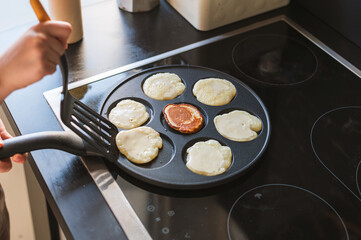 Cooking Pancakes on Modern Stove