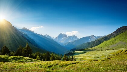 Obraz premium scenic valley landscape with mountains sunlight and blue sky in daylight