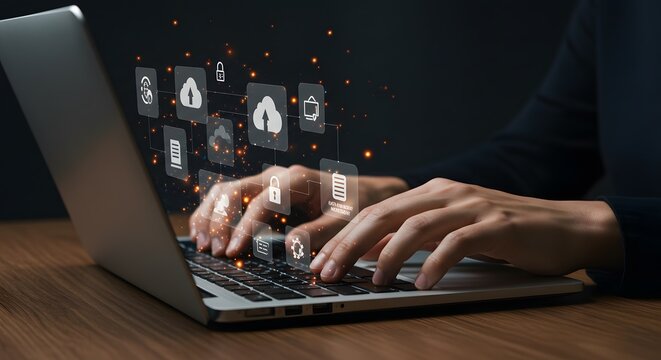 Hands typing on laptop with digital cloud and security icons overlay