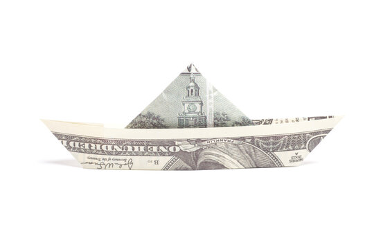 Money Origami boat with one hundred Dollar bills