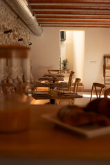 table from a hostel prepared for breakfast