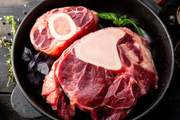  Raw osso buco beef and spices for its preparation