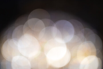 Circle Bokeh elegant Defocus on black and yellow Christmas tree is surrounded by a bokeh blur,...