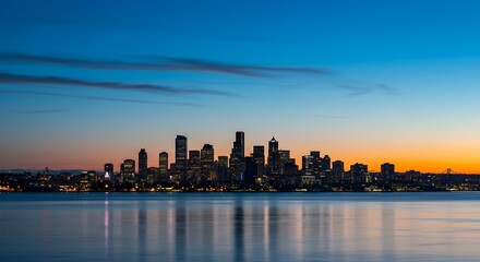 Fototapeta premium City Skyline at Dusk with Water Reflection