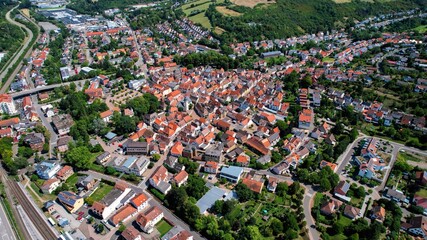 Aerial view around the old town of the city Rockenhausen on a sunny spring noon