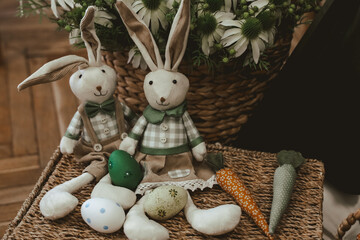 Festive bunnies and Easter decorations displayed in a rustic setting for spring celebration