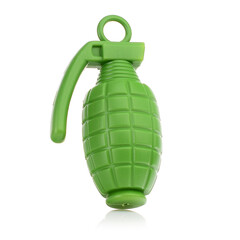 Green plastic toy grenade on a white background.