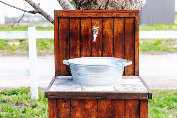 Rustic outdoor wash basin designed for gardens or farm settings