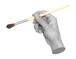 Woman hand holds paint brush, isolated on transparent background, painting and design concept....