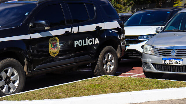 Police car in a parking lot at a Brazilian police station. Photo captured on July 11 2025 in Mogi das Cruzes - SP - Brazil