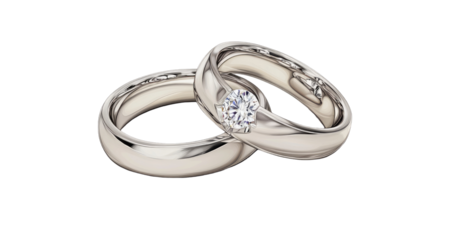 Two elegant wedding bands, one with a centered diamond