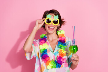 Photo of lovely young woman have fun cocktail sunglass wear shirt isolated on pink color background