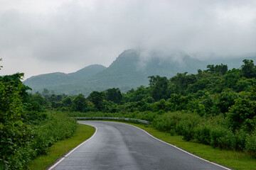Monsoon road turning through wet green hills, Purulia, West Bengal