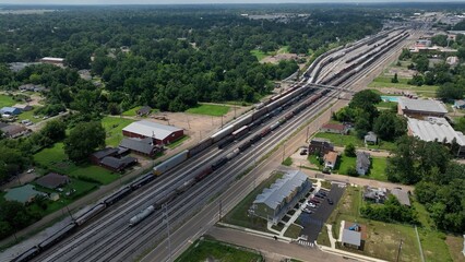 Rail Road Yard with train cars on tracks awaiting transport of commercial products in Jackson,...