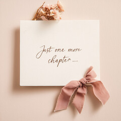 Flatlay with book quote card – Just one more chapter, book lovers concept